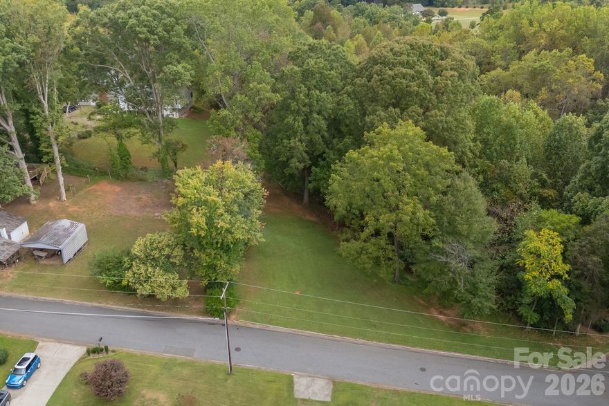 Looking to build your dream home? You will want to take a look at these two parcels in a well established downtown Troutman neighborhood. The .50 parcel and the .25 parcel are being offered together. Public sewer and water are available at the street (hook up fee would be a buyer expense). There is a 490 sq. ft storm drainage easement at the bottom of the .25 acre Patterson property. Extremely convenient to walking trail, ESC Park, and Main St businesses.