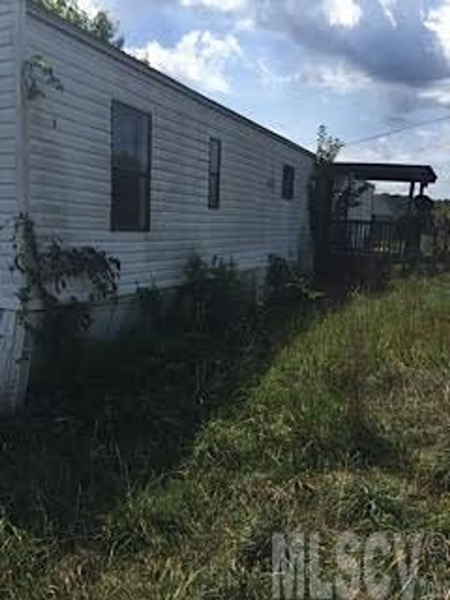 Single wide mobile home that needs repairs in order to be habitable. After repairs, it would make a terrific rental or primary residence. Home is being sold as-is.