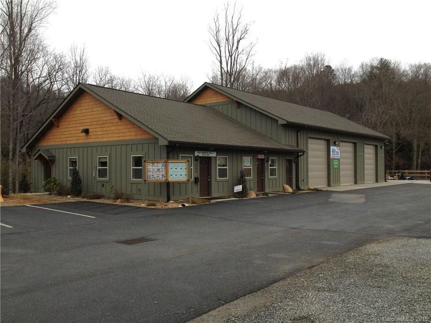 Office/Retail space(formally realty office) and 5 bay auto center, on 5 lane Highway 74A, great visibility in both directions, built in 2012, large paved parking area, handicap accessible, beautiful creek/picnic area along back of property, fully occupied, call listing agent for details.  Includes Pin# 9676-87-8550.