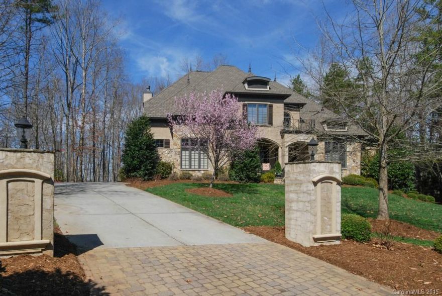 Sellers have REDUCED for quick sale!!! Gorgeous Custom Estate Home in Highly Sought After Springfield. You won't find a BETTER DEAL on a Custom Home. Privacy surrounds on wooded Golf Course View lot.5 Bdrm's ALL w/WIC's and attached baths PLUS Bonus Room. Gourmet Kitchen w/Granite; Built In Fridge;custom Drop Zone Cabinetry & side carriage entry. Wood floors refinished in September and most rooms w/new carpet! Both Upstairs & Main level laundry for convenience! Don't miss out!!!