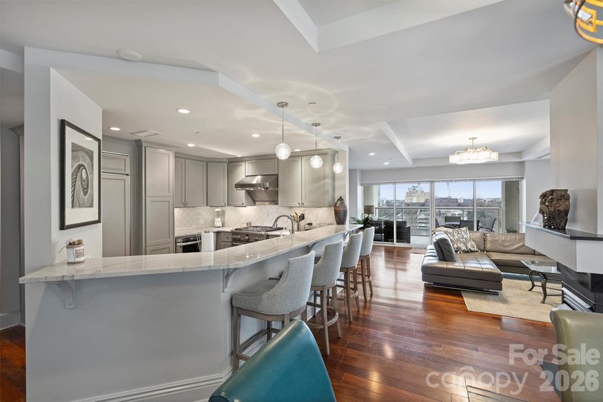 The Madison is a 26-unit upscale condominium community offering boutique-style living in the heart of the city. This renovated luxury condo features high-end finishes throughout and provides true walkable urban living. Ideally located with convenient access to dining, shopping, entertainment, and nightlife.
The kitchen features quartzite countertops, custom tile backsplash, updated pendant lighting over the bar, and a beverage cooler — ideal for entertaining.
The guest bath includes decorative porcelain tile flooring, custom shower tile, quartz countertops, updated sink and fixtures, designer wall covering, modern lighting, and glass barn-style shower doors.
The primary bath offers Carrara marble countertops, new sinks and fixtures, a full-wall mirror, updated lighting, and handcrafted Italian tile flooring.
Additional upgrades include updated interior paint, new lighting and ceiling fans throughout, and a premium surround sound system with Bluetooth connectivity, receiver, and HEOS integration. TV and sound system (approximate $10,000 value) to remain.
Move-in ready and thoughtfully updated, this condo offers modern comfort in a prime urban location.
Additional amenities include: Fitness center and Concierge service.