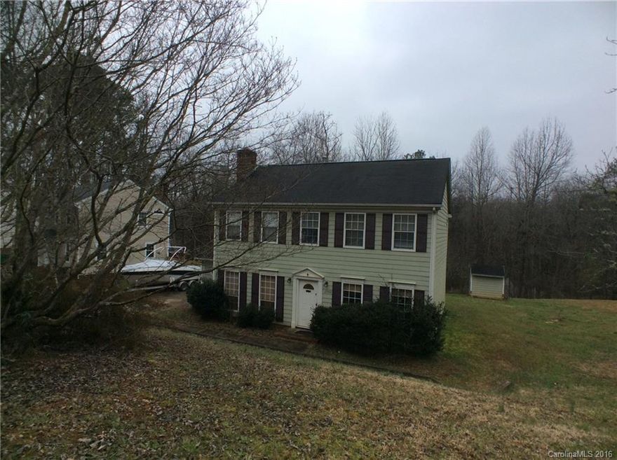 This 3-BR, 2.5-bath home offers over 1800 sq.ft. of living space. Features include wood laminate floors on main, brick masonry fireplace in carpeted LR, formal DR, and updated kitchen with breakfast area and granite counter tops. Second floor master suite is accented with vaulted ceiling, and private bath features walk-in shower and water closet. Large backyard includes patio and storage shed. Close to I-77, I-485, shopping and dining, and minutes away from Uptown.
