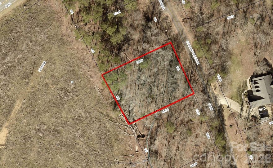 Beautiful lot in Woodbridge s/d is waiting for you to build your new dream home! This lot measures approx .473 acre and is located near Moss Lake and Woodbridge Golf Course. This location provides privacy but is still only minutes away from Hwy 74 and I-85, which provide access to shopping, dining, leisure, health care etc. This a great place to make your dreams of a new home come true. There is something here for everyone, whatever your interests. County water is available and a septic tank would need to be installed. More information on Woodbridge HOA, restrictions, bylaws, etc. can be found at woodbridgekm.com.