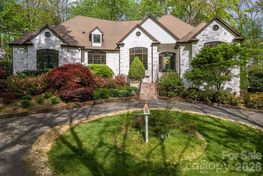 Stunning custom built, one-story brick home, a private sanctuary sitting on 3.5+ acres of wooded bliss in the highly desirable Southampton neighborhood! As you step inside, you will enjoy an abundance of natural light and soaring 10'-12' foot ceilings that create an airy, expansive atmosphere, rich finishes that flow throughout the home, large windows, custom millwork, an inviting living space complete with a gas log fireplace and wet bar -a dream for those who love to host and entertain. The heart of the home is a gorgeous, fully updated kitchen that truly is a chef’s dream. It boasts modern conveniences and high-end finishes, ample counter space and premium cabinetry, an open layout that keeps you connected to your guests. The primary suite is a true retreat, featuring a massive footprint, custom walk-in closet system, and a beautifully updated ensuite bathroom. One of the home's standout features is the huge second living space. Whether you need a multigenerational living suite, a high-end home gym or office, this flexible area adapts to your lifestyle. The detached 4-car garage is a rare find, featuring two dedicated workshop areas - ample room for projects or storage. Escape to the outdoors on the beautiful covered brick patio, overlooking a fenced backyard and surrounded by acres of mature trees. Fully updated and move-in ready, this Southampton gem offers the rare combination of a custom brick ranch with the expansive acreage you’ve been searching for, in a great school district, and close to shopping and restaurants.