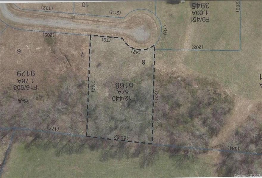 Fairly level buildable lot in a cul-de-sac , with  backdrop of pasture land and mountains. Located in Little River Valley area just off Everett Road.  Location is good for Brevard, Hendersonville or Asheville commute.