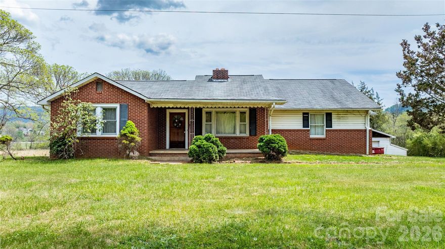 Located on Cane Creek Road, this brick ranch offers a rare opportunity to create something truly special. Situated next to Cane Creek Middle School, the property features a flat, usable lot with plenty of space for outdoor use, expansion, or future improvements.

The home provides a solid starting point with a traditional layout and full brick exterior, offering durability and long-term value. With the right updates, this property has strong potential as a primary residence, rental, or renovation project. The lot itself is a standout—level, accessible, and increasingly hard to find in this area.

Positioned in the heart of Fletcher, you’re just minutes from South Asheville, Hendersonville, and Asheville Regional Airport, with quick access to shopping, dining, and major roadways. Cane Creek Road is known for its blend of convenience and scenic surroundings, making this a highly sought-after location.

Whether you’re looking to renovate, invest, or build equity in a prime area, 1720 Cane Creek Road offers the location and lot to make it happen. Interior photos coming soon.