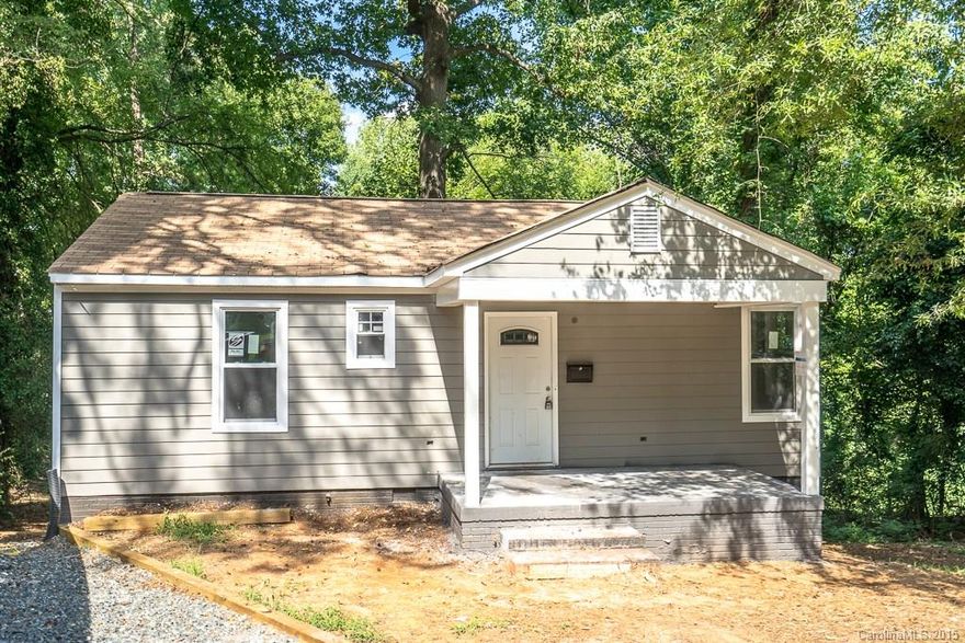 Brand New home without the new home price tag, this home was taken back to the studs and completely redone. new roof, windows, electrical, HVAC,all fixtures in bath room and kitchen features, granite and stainless new appliances, new laminate flooring,all insulation in the home and basement area has also been replaced. This home is absolutely adorable and waiting for its new family. Conveniently located, close to downtown Charlotte. Great investment opty!
