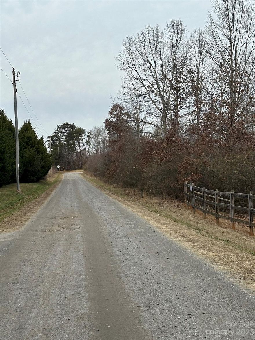 Come build your dream home in popular North Iredell! This private lot with beautiful country views offers 214 +/- ft of road frontage on Stine Rd, reached by gravel road after turning off Rimrock Rd. This building lot would make a perfect place to call home with room enough to enjoy the outdoors on your very own property! Country living at its finest and only minutes from I-77 and I-40. A soil evaluation and survey have been conducted and results have found that the lot is suitable for a conventional septic system.