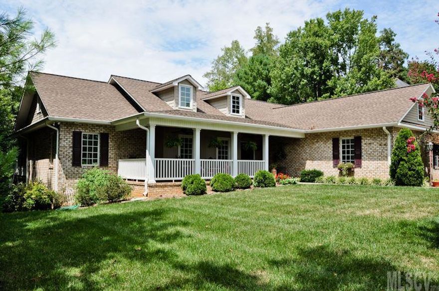 Stunning Brick Home in Hickory's Premier Waterfront & Golf Community.   4400 Sq ft - 3 Bdr, 3 Bath. Large Master and bath. Brazilian Cherry flooring, open floor plan, vaulted ceilings, roomy gourmet kitchen with Island & Walk In Pantry, Granite, Stainless Steel Appls, Heated Sun Room, Laundry with Sink on Main. 2 car garage. Deck with Awning overlooks a beautifully landscaped yard and #16 fairway on the Ole Still Golf Course.  Walk downstairs to large Game Room w/Pool Table, Bar Area, Fireplace Gas Logs, Workout Room, Heated Workshop, Bathroom, fireplace with logs and Entrance to Private Hot Tub Area.  Quiet Dead End Street, Community Boat Dock and Picnic Area.  Pool Table, Bose Speakers & Hot Tub convey.  Low HOAs only $420 Yr.  Street Lights and Roads Maintained by State.  Golf Membership is Available at Ole Still Golf Club, owned by Warrior Golf Management.  Visit:  www.flyBUYrealestate.com and www.oliverslandingnc.com and www.olestillgolf.com