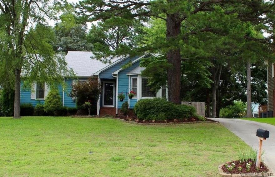 Quaint, 3 bedroom, 2 bath, Ranch style home with great floorplan and lots of character! Gorgeous floors in main living area and gas log fireplace in living room. Plenty of kitchen cabinets, stainless appliances, & built in pantry. Lot's of natural light from the Bay window in dining area. Oversized master bedroom, with room for a sitting area, and walk-in master closet.  Fenced in back yard with wired storage shed. Great location, near I-77, schools, and shopping!