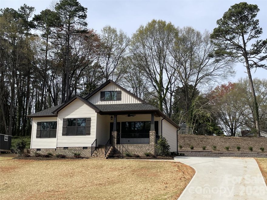 ATTENTION! Seller will pay $3,000 in buyer closing costs with full priced offer. Popular Adrian plan with granite countertops (kitchen and baths), tiled backsplash and shower surround, and stainless steel appliance package including the built-in microwave hood and refrigerator. The primary suite offers a walk-in closet and a deluxe bath with a tiled step-in shower and glass door. Enjoy the outdoors on your covered front porch or entertain on the spacious 16x16 rear patio graced by the extensive block landscaped wall. Efficient all-electric home with heat pump. Located just 16 miles from Charlotte Douglas International Airport, this home combines modern efficiency with quaint small town living, and no HOA! View the Matterport tour of a similar plan to virtually walk through a completed Adrian plan. See representative photos attached for completed Adrian projects.