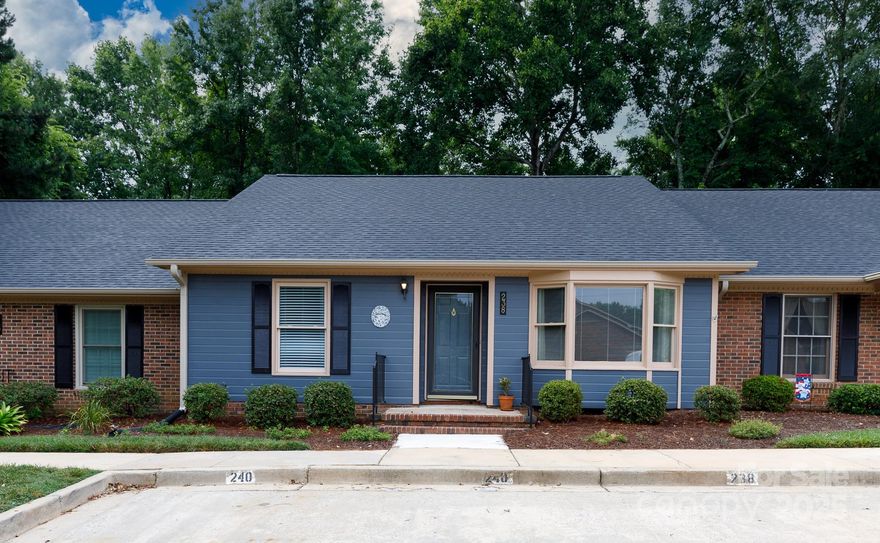 **SELLER OFFERING $4,000 CREDIT*** Enjoy effortless, care-free living in this charming 2-bedroom, 2-bath condo offering comfort and convenience all on one level. A bright bay window fills the living room with natural light, while the spacious dining area is perfect for everyday meals or casual entertaining. The kitchen includes a pantry and comes complete with a refrigerator, plus the washer and dryer will stay—making this home truly move-in ready. The large primary suite features dual closets and a private bath. Step out back to a peaceful deck overlooking the woods, with an attached storage area for added functionality. Yard maintenance is included, and you're just minutes from shopping, dining, fitness centers, and medical offices.