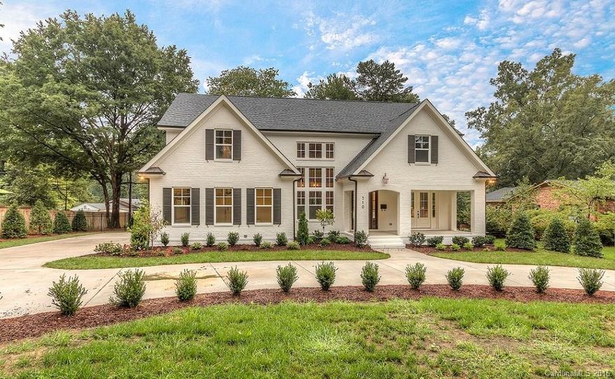 Cotswold!! New Construction! Elegant 5 bed 4.5 bath custom home in the heart of Cotswold. Master on main! Side load garage with circular drive. Full brick exterior...painted white with a tint of grey. Covered front veranda and eight foot custom Mahogany entry door. 5" site finished hardwoods throughout, custom trim work, 8' solid core doors. Gourmet kitchen boasts large island, Wolf dual fuel range w 6 burner cooktop, Sub Zero fridge. Quad slider to large covered outdoor living. Sod/irrigation