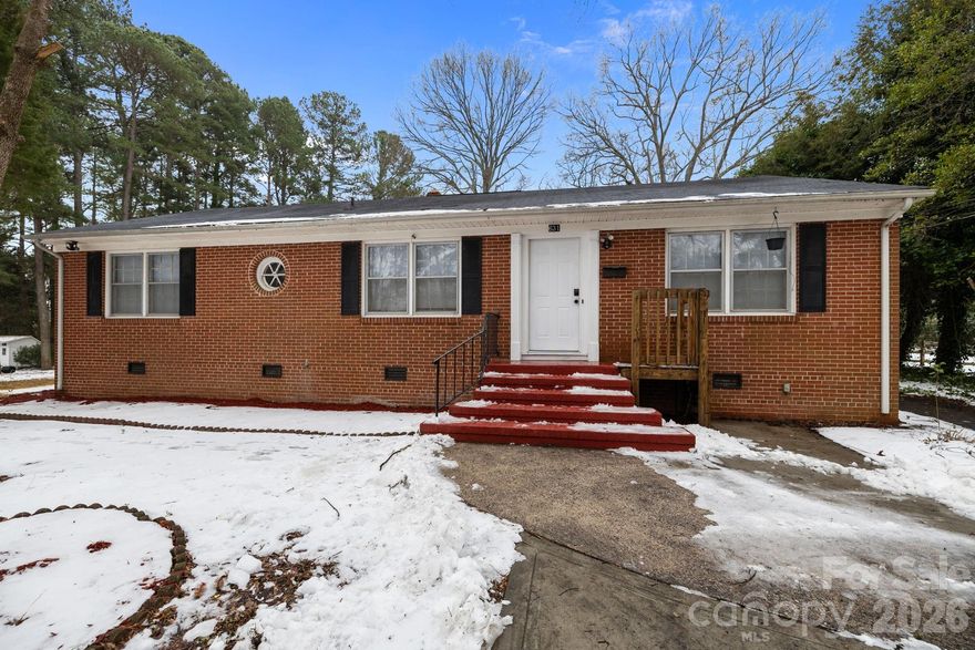 Set on a generous 0.49-acre lot, this beautifully renovated brick home in Gastonia offers 3 bedrooms and 2 full bathrooms. Move-in ready with new PEX plumbing, a new gas water heater, and a modern kitchen with granite countertops and brand-new appliances.

The home features a cozy fireplace that adds warmth and character, a covered porch, a 153 sq ft deck, and a spacious backyard with plenty of room for outdoor living, gatherings, or future projects, plus a large attic with attractive exposed wood framing, offering ample storage and added character. Conveniently located near local schools, shopping, and dining, this solid brick home combines space, comfort, and lasting quality.