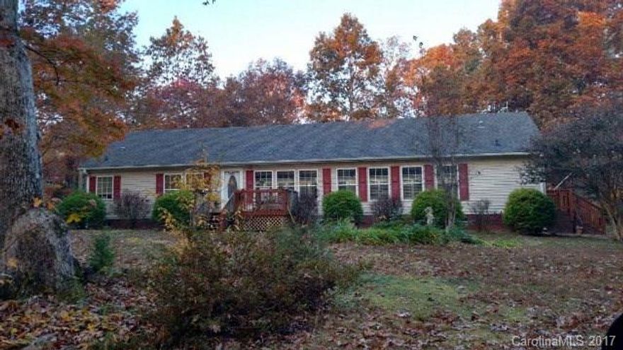 This property is located on Reeves Island Road. Convenient to lake & if looking seclusion this is it! is wildlife all The home has a his & her bath, his side has a shower, toilet & sink & hers has a whirlpool tub, sink & toilet. There is 220 plug in bedroom for a tanning bed. Items to remain dishwasher, refrigerator, stove, microwave, ceiling fans & all window treatments. Items not to remain are small metal building, dog lot & weather station. Satellite dish & receivers, fuel tank are leased.