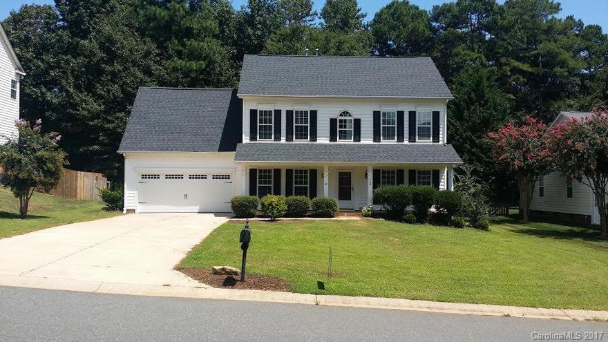 Beautiful home nestled in an established Neighborhood. Zoned for Award Winning schools.Recently UPDATED w/New Flooring, Roof & HVAC.Kitchen boast of Subway tiles, built in desk area,New Granite countertop & all New  Stainless Steel Appliances.Open Breakfast area has a bay window w/a pretty view of the wooded backyard.Ofc or Den enclosed with sliding frosted glass doors for extra privacy.Spacious Master Ste enhanced by tray ceiling, dual vanities & garden tub. Separate Exterior door from garage.