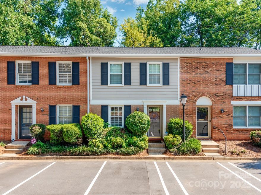 Charming Townhome Featuring Prime Location with Walkability to Montford Restaurants and Nightlife, the Scenic Greenway, Park Road Shopping Center and So Many Great Lunch Spots as Well. The Perfect Combination of Convenience and Comfort Awaits! Many Recent Upgrades, Fresh Paint and Professionally Cleaned - Move in Ready. The Transitional Layout of the Downstairs is Very Comfortable for Entertaining and Every day Living. The Two Bedrooms are Spacious with Nice Large Closet Space. There is a Wonderful Private Enclosed Brick Paver Patio ready for Grilling and Outdoor Enjoyment; Truly Special Oasis in the Spring and Summer Months. Enjoy the Community Pool and Social Aspect of a Neighborhood Feel while Living in the Middle of the City. HOA includes Water, Sewer, Trash, Cable and Internet. Parking Lot has Just Been Newly Paved.