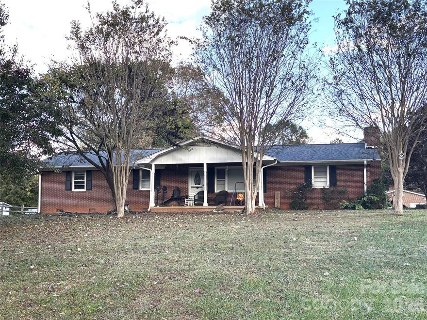 Attention Investors: This property features a 3BR/2BA brick home with a single carport, update kitchen and baths, newer bamboo flooring in the family room and dining room  with an additional three manufactured homes. The homes are all occupied and on leases. One new manufactured home was just added new in 2023. All this sitting on almost 3 acres actually 2.98 Acres. Please do not disturb tenants.