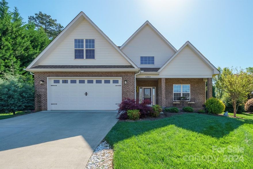 Welcome to your dream home in the heart of NW Hickory's serene Waterstone subdivision. Stunning home built in 2018 offers 4 BRs & 3 full baths + bonus rm. From the moment you step inside, the 2-story foyer welcomes you to a lovely feel. Main lvl living boasts an open floorplan w/a 2-story LR featuring a modern FP & dining area w/tray ceiling which opens up to a kitchen that any chef would love! Granite cntrtops, center island w/brkfst bar, & pantry closet. Your oasis awaits in the main lvl primary suite--complete w/a tray ceiling, 2 WICs w/barn drs, & a private BA w/garden tub, walk-in tiled shwr, & dual sink vanity. An additional BR on the main lvl offers access to a full bath(& off foyer) which ensures comfort for guests. Upstairs holds 2 more BRs(one w/a huge WIC) + a large bonus rm. The screened back porch overlooks a private, beautifully landscaped yard, inviting you to relax & enjoy the peaceful surroundings. Close to the new Riverwalk, parks, & local amenities just moments away!