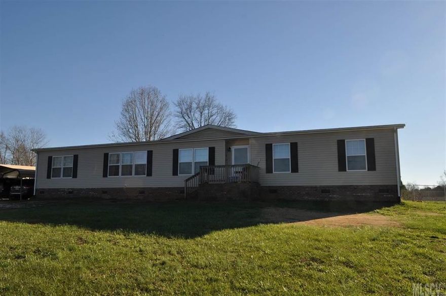 Looking for a country setting with scenic view of long range mountains? A spacious home is a great feature for entertaining with ease. Each room flows into another and highlighted with natural light from the windows. The Living Room is accented by a gas fireplace to provide warmth on cool days as you relax or watch the game. The Kitchen has cabinet space, pantry storage, and countertop space to meet your storage and entertaining needs. Enjoy your meals at the Kitchen Island or in the Dining Room gazing out into the back yard. The Laundry Room is adjacent to the Kitchen and easily accessible. The large Den provides extra space for your gatherings. The Master Bedroom has a large walk-in closet and Master Bath displays double vanity sinks, cabinet space, countertop space, garden tub, and shower. Enjoy the nice days or weather on the back deck or in the front yard admiring the view. A fenced-in area is located at the back of the property. Home Warranty included.