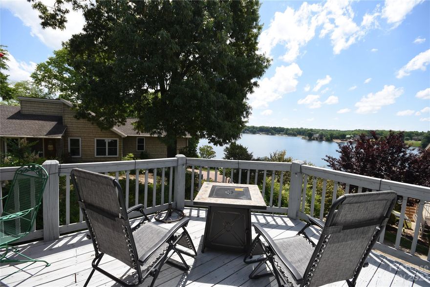 Amazing views of Lake Wylie!  Fabulous updated 3 BR. 2 BTH ranch at the end of Point Clear available for occupancy July 17, 2023.    Well maintained cozy cottage overlooking Lake Wylie offers a very open floor plan with a large updated kitchen and breakfast room open to great room with fireplace.  Oversized decks in back have beautiful lake views.  Relaxing front porch also has beautiful lake views.     Home is in very good condition.