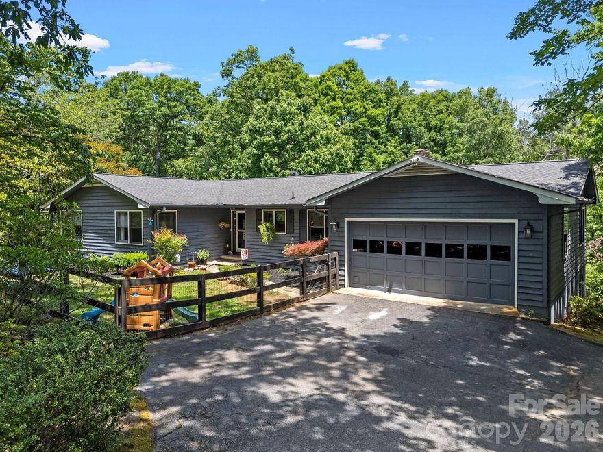 A delightful property in the desirable Gillette Woods community of Tryon.  You will be welcomed into this well cared for and inviting family home that offers plenty of living space including the living room, family room with a wood burning masonry fireplace and and enclosed sun porch and back deck. The kitchen includes all appliances. All of the bedrooms are located on the main level, and there is direct access to the basement that offers additional living area that could potentially give and option for an apartment, plus plenty of room for storage and shop area.  Fenced front and back yard for your family and pets.  This home also offers high speed internet access and is on the Tryon water system.  The HOA is optional and the Sellers are not currently members. This home has a great feeling about it and is located only minutes from downtown Tryon.  Come and take a look, this may seriously be your next special place to call home!!!