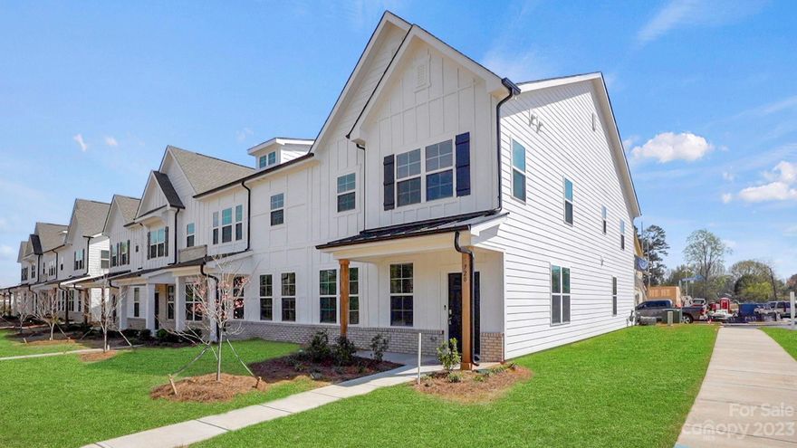 END UNIT AVAILABLE NOW! Fabulous location!! Close to shopping, dining & quick I-77 access to Charlotte.  This 1762 SF luxury townhouse boasts 9 foot ceilings, 3 bedrooms, 2.5 baths, open concept kitchen overlooking the dining & great room.  Primary suite featuring an oversized tile shower with bench, double sinks, 2 walk-in closets, trey ceiling & seating area. Both guest bedrooms have walk in closets. Kitchen features Stainless appliances, large pantry, 5 burner gas range with convection/air fryer oven, tile backsplash & granite countertops. Laundry room with room for folding table & more.  Oversized rearload 2 car garage with 2 car driveway. So many upgrades in every home! Giana Gray interior design package. Gorgeous HOA maintained lawn for carefree lifestyle & community park for outdoor fun. End of building home with extra windows & oversized side yard. Ask about our current promotions!