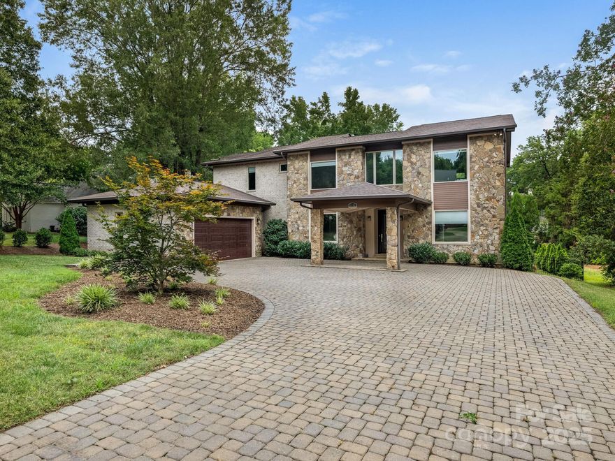 Stunning one of a kind custom home nestled on beautifully landscaped .43 acre lot in a quiet cul de sac near SouthPark Mall. Bathed in natural light, this modern residence features soaring ceilings, expansive windows and a smart open floor plan ideal for stylish everyday living and entertaining. Gracious foyer, dining, powder and great room with double sided fireplace seamlessly connecting to gourmet kitchen with island, SS Thermador appliances, walk-in pantry, drop zone w/ access to 2 car garage. Solid hickory wood floors throughout. Main floor guest suite includes full bath and a study perfect for work or gym. Upstairs the spacious primary suite includes his and hers walk-in closets and a spa-like bath with soaking tub, dual vanities and glass enclosed shower. Two additional bedrooms (one w/ en suite), versatile loft and laundry. Outdoor living shines with a covered terrace , BBQ , pool, and yard space for future sports court or play area. Easy access to airport and highways.