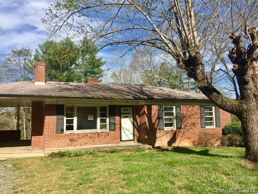 Looking for a fixer upper? This could be the one. This 3 bedroom, 1 bath brick ranch with a basement that sits on an acre of land is just minutes to downtown Morganton. Home is in need of extensive interior repairs. The bank does offer some owner financing options.