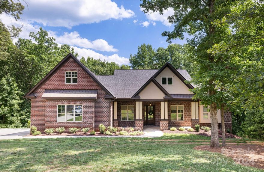 Don't miss out on the opportunity to buy this custom-built home in highly sought after Providence Woods!  Situated on almost 2 acres, privacy becomes a reality as the home sits tucked back off a private cul-de-sac.  Built in 2018, the home features the primary bedroom on the main floor with own private deck access, soaking tub in the luxurious primary bathroom, limestone fireplace surround in 2-story great room, oversized 2-car garage, an abundance of storage throughout, and a new 12'x16' shed for all your outdoor toys.  Large, level front yard perfect for throwing with the kids while the backyard sits as a canvas just waiting to be maximized.  Award winning Union county schools, low HOA, and minutes from Waverly and Promenade shopping areas! This home is just waiting for you to take advantage of all that it has to offer!