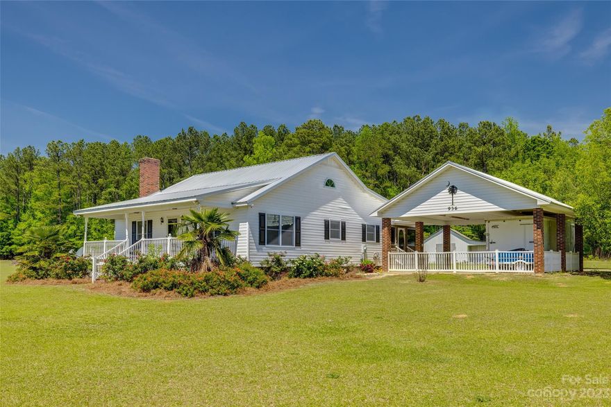 A little over an hour's drive from Charlotte will place you on this gorgeous country estate of nearly 15 acres! With fertile ground, a small forest, serene pond and more.  A barn/workshop that is great for a hobby and more.  The home, wrapped in rich, adorning landscaping that compliments, a spacious front porch is just the spot for a slow rock and tall glass of tea while overlooking your land. Head to the sunroom and bask in the warmth of natural light. Indoors, the beauty and comfort continues with an eye-catching stone fireplace. The kitchen offers rich, Red Oak cabinets, granite counters that are absolutely stunning, and a stone façade front bar area. This cozy country home won't disappoint with it's three bedrooms and spacious closets. Home is located within 6.2 miles from Elite Motocross Training Facility (Club MX) Come see what this gorgeous space with its expansive views has to offer! Make your appointment today!