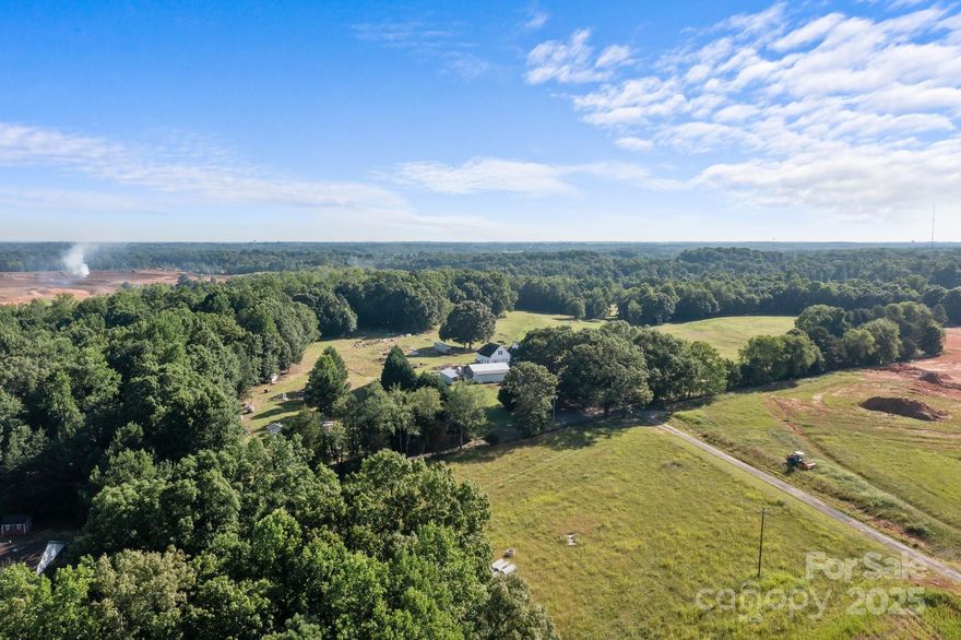 Great opportunity acreage for development!Property was rezoned commercial..This property offers 42+- acres.Located just outside the town of Troutman right behind the concrete plant off Murdock road. This property offers easy access to I-77 and is very close to major commercial growth. There are two homes and numerous barns/buildings on the property that will convey at no value.