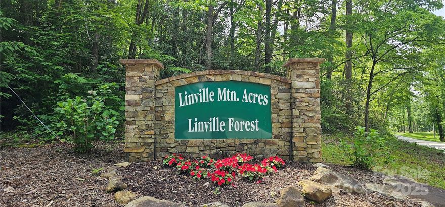 Nestled high on a quiet, winding mountain road, this pristine wooded parcel offers a rare blend of seclusion and panoramic views. Timbered with mature hardwoods, the property provides a natural buffer from the outside world and backed by a National Forest, while a cleared building site perches at the crest of the ridge, ready for your custom retreat. From this vantage point, you’ll greet each morning with miles of rolling green hills, framed by distant peaks. The gently curving access road ensures privacy yet delivers easy year-round entry, and nearby utilities make bringing your dream home to life. Imagine a cozy wrap-around deck capturing endless sunsets, or a glass-walled great room that lets you feel immersed in the view. Whether you’re seeking a seasonal cabin, a permanent residence, or an investment in mountain acreage, this offering combines serene woodland living with dramatic, forever-wild vistas. Peace, privacy, and panoramas await on your slice of mountaintop paradise.