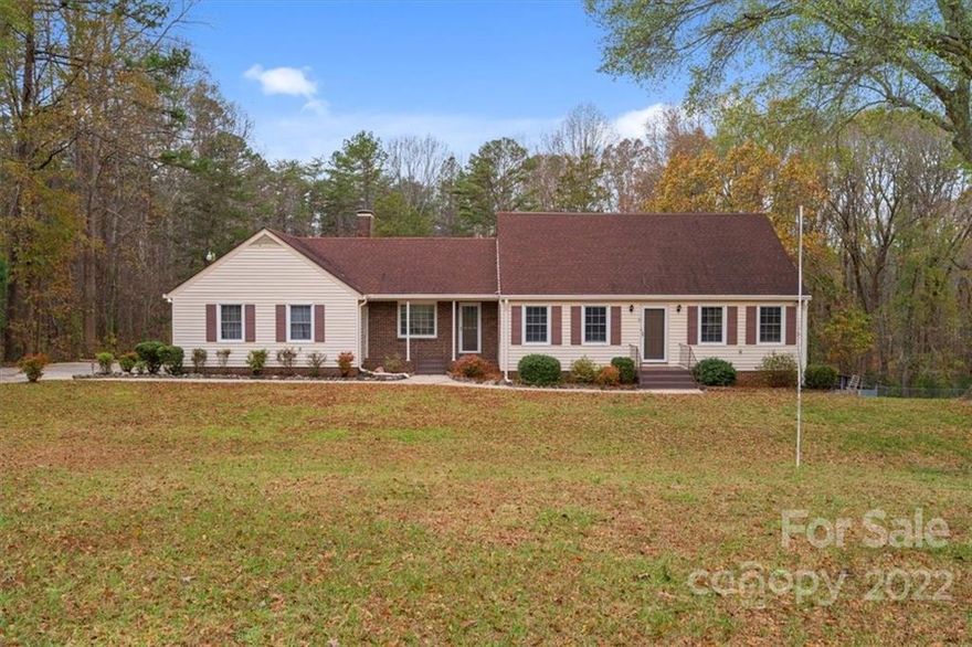 Tucked away in a quiet country setting just outside thriving downtown Clover SC is this gorgeous home just waiting for its new owners!  Located on over an acre with lots of updates and renovations!  Inside you will find new LVP flooring that lines the main living areas.  A living room, family room with gas fireplace, kitchen with granite and dining area give you plenty of room to entertain your family and friends!  The main level also has a primary bedroom with a newly renovated bathroom, another bedroom or office, half bath and laundry room!  Upstairs you will find two more large bedrooms and another full bath!  The basement has plenty of storage and a second location for washer and dryer!  Outside there is lots to do whether your grilling out on the back deck, taking a dip in the pool or playing a game of back yard football there is something to do for all 4 of our southern seasons!  Clover schools!  Welcome home to 1949 Crestwood Lane!