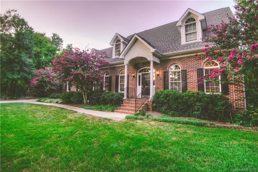 Classic South Carolina Lowcountry full brick beauty in booming Fort Mill! Located in desirable golf course neighborhood, Ardrey Acres, this home is nestled on nearly 2/3 acre quiet cul-de-sac homesite. Highlights include owner’s suite downstairs w/dual vanities & jetted tub, custom millwork throughout, vaulted ceilings in the welcoming great room, oversized secondary bedrooms & chef's kitchen w/brand new stainless steel appliances.  Don't miss the opportunity to visit this fantastic home!