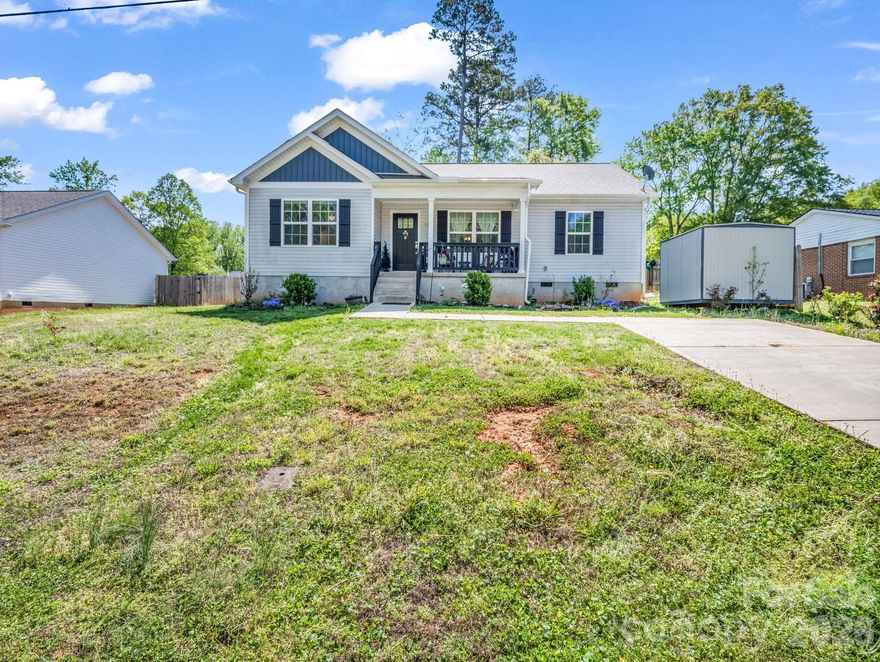 Open ranch-style home with 3 bed/2 baths. A bright white kitchen with Shaker-style cabinets, stainless steel appliances, vaulted ceiling, and granite countertops. LVP flooring throughout the main areas and carpet in bedrooms. Split bedroom plan with a large primary bedroom and attached full bath with dual sinks and a walk-in shower. Two additional bedrooms with shared bath. Situated on a manageable 0.25-acre lot, this property offers just the right amount of outdoor space for relaxing or entertaining without the burden of extensive upkeep. Enjoy the convenience of being just minutes from downtown Forest City, the Thermal Belt Rail Trail, local shops, dining, and more. Whether you're a first-time buyer, downsizing, or looking for a move-in ready home with modern features, this one checks all the boxes!