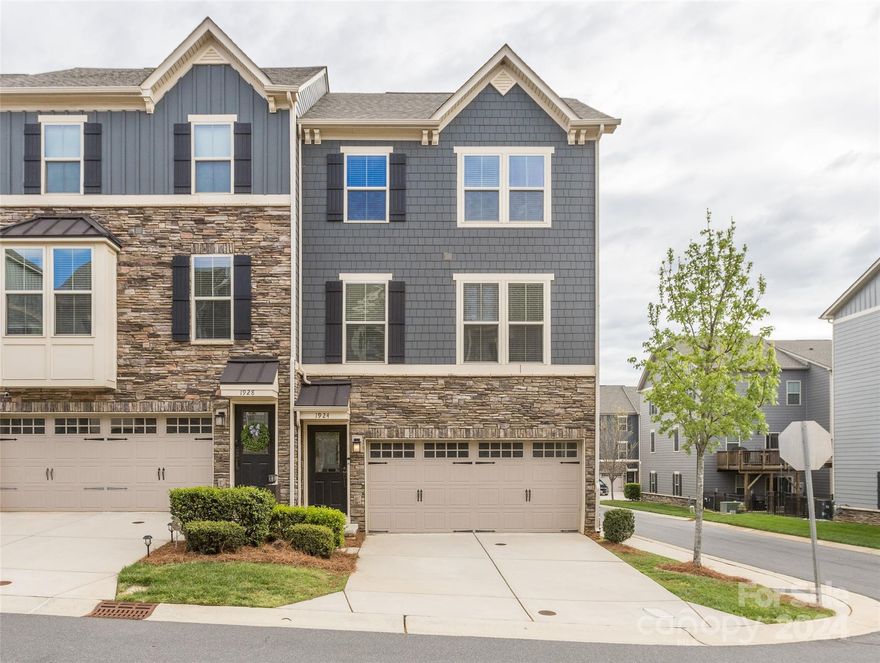 This corner unit townhome in booming Oakhurst is a Must-See! The open floor plan boasts tons of beautiful natural light. The large kitchen is a cooks dream with quartz counters, a four burner gas stove, large island, timeless tile backsplash, white shaker cabinetry and a large pantry. The dining area with direct balcony access makes for seamless indoor/outdoor entertaining. The living room provides amazing space for relaxation and movie watching. The top floor hosts the oversized primary retreat and includes a walk-in closet, an en-suite with dual vanity, large soaking tub, and shower stall. The secondary bedrooms are light filled with large closets and share a three piece hall bathroom. The lower level offers a large family room for additional gathering space with direct access to the outdoors. Just a stones throw from Common Market, Night Swim Coffee, Teal Turnip and soon to be Oakhurst Commons. Don't miss out on this fantastic opportunity to call this one your own.