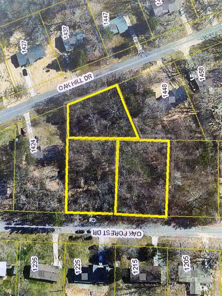 Three adjoining wooded lots for the price of one! One lot on Oak Hill Drive and the two lots behind it on Oak Forest Drive.  Build your new stick built home or modulars are allowed.