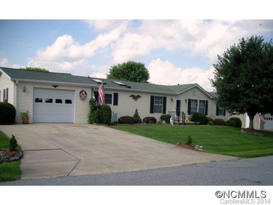Everything you want is here! Nice family room with gas fireplace, Open to kitchen w/gas stove. Large 3 season sunrm. Patio to grill or enjoy the sun.Gas heated to save you $$$.Extra parking area.Lge. Garage has extra storage & workshop. Split bedroom  suite plan gives you privacy. Enjoy the 2 Clubhouses pool & hot tub. This 55+ community has a very active calendar...you can join in or not, your choice.Great for newcomers.See it now!!