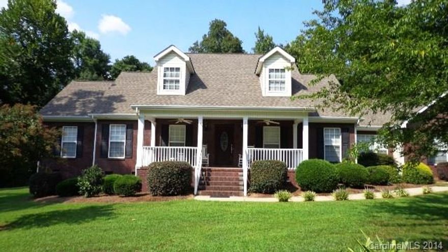 Lovely brick & vinyl sprawling ranch with nice finished bonus over garage (independently heated & cooled), an 80 +/- ft patio, lg front porch & back deck for outside entertaining to the fullest. Vaulted & tray ceilings in GR, DR & Mst BR has his & hers master baths & closets, double built-in bookcases/storage flanking gas fireplace, beautiful cabinetry, floors in kitchen. Part of lot heavily landscaped; part natural for privacy; COUNTRY CLUB amenities available-golfing, swimming, social, etc.