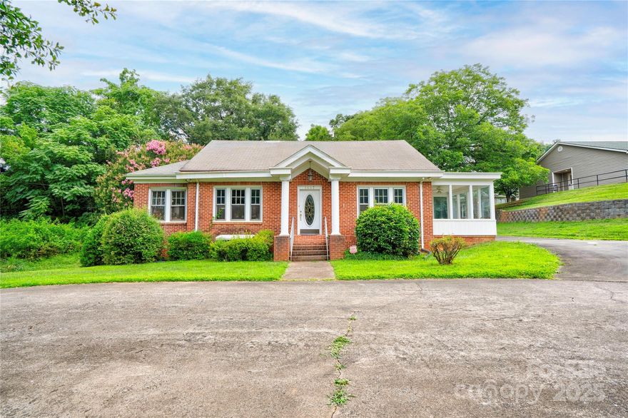 Charming brick property filled with original character in a prime Shelby location! This 3-bedroom, 1-bath property features hardwood floors, crown molding, a fireplace, and large windows that bring in plenty of natural light. A formal dining room, functional kitchen, and inviting sunroom add to the appeal. The home also includes a walk-out basement with 1,818 sq. ft. and a spacious attic offering 1,674 sq. ft., perfect for storage or potential expansion. With great curb appeal and versatile OR zoning (Office/Residential), this property offers flexibility for a residence or possible office use. Also listed as commercial MLS #4280262.