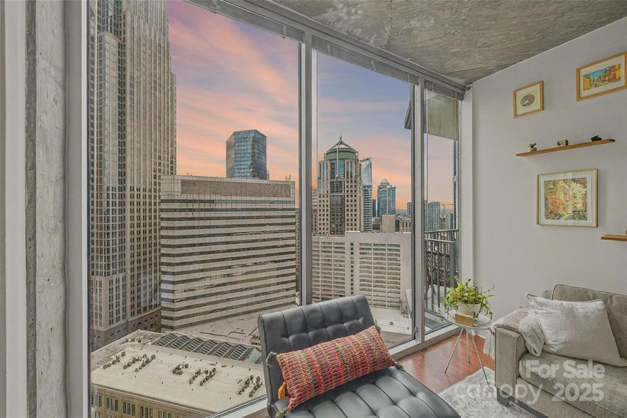 Live above it all in this modern and spacious high-rise condo perched on the 24th floor in the heart of Uptown Charlotte. This stunning residence features an open-concept layout and floor-to-ceiling windows that flood the space with natural light while offering breathtaking views of the city skyline. Step out onto your private balcony to soak in the sights and energy of the Queen City. Inside, enjoy sleek finishes, a bright and airy atmosphere, and plenty of room to entertain or unwind. 
Additional storage is available in the building, and the current owner has the largest storage unit. Storage units in the building can be bought and sold freely, making it easy to secure extra space if needed. 
As part of Avenue, one of Charlotte’s premier residential buildings, you'll have access to resort-style amenities including a rooftop pool with panoramic city views, a fully equipped fitness center, clubhouse, business center, concierge services, and a gated community entrance. Located steps from dining, nightlife, and entertainment, this is city living at its best - stylish, convenient, and truly elevated.