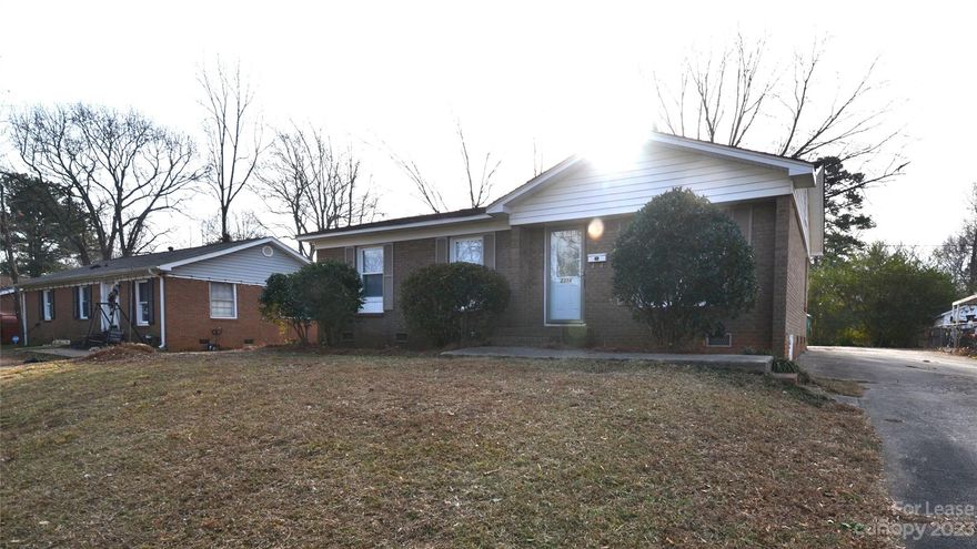 Lovely Ranch style home not far from Uptown Charlotte. This cute 3 bedroom 1 bathroom home offers lots of natural light.  There are hardwood floors in the family room, hall and bedrooms along with tile in the kitchen and bathroom. Home host large family room, large eat in kitchen with stainless steel appliances and laundry room off kitchen with access to the back door. Relax or entertain in the nice back yard. Home is close to shopping, restaurants, highways and public transportation. Come take a look while you still can.