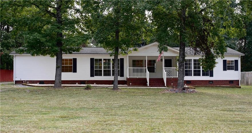 Completely and lovingly restored home on a large lot with open concept floorplan. Kitchen features butcher-block top island and built-in table. Large family room with fireplace. Upgraded lighting. New HVAC and appliances. Fresh paint and new carpet. Covered 16 x 20' deck. Huge warehouse shed is 650 s/f. Sheer curtains, refrigerator, W/D, kitchen chairs all convey with property. Quiet street.  You cannot beat this value - truly won't last!