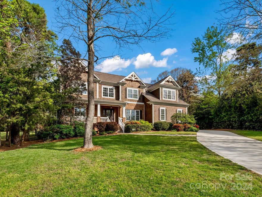 Don't miss this gorgeous home in the heart of the Peninsula community! This 5 bedroom and 4.5 bathroom home on almost half an acre is nestled in a tranquil cul-de-sac lot with a flat and private backyard perfect for entertaining at your Kitchen-aid gas grill. The open-concept kitchen is a chef's delight with Viking Professional appliances and an enormous island. Other great features include the main floor guest suite, 3-car garage, spacious master suite, large closets, and custom built-ins or ceiling accents in many spaces throughout. Don't miss the spacious 2nd floor bonus room as well as a 3rd floor with a theatre room and extra walk-in storage. This home is situated with quick access to all of the Lake Norman and neighborhood amenities in both the Peninsula Club and the nearby Peninsula Yacht Club. Experience luxury living at its finest—schedule your showing today and make 18507 Square Sail Road your new home soon!