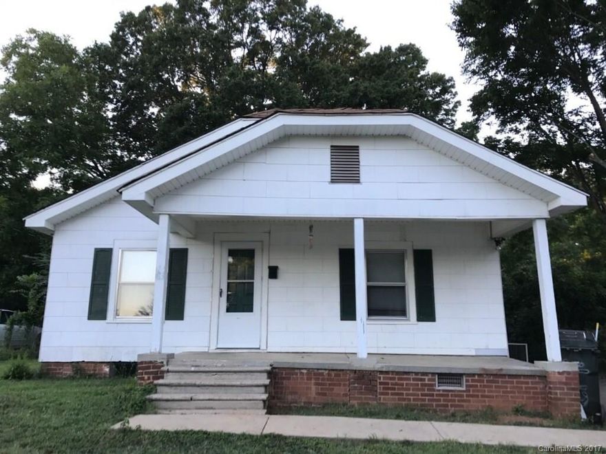 Cute home in the heart of Rock Hill.  Home has lots of potential and has a large private backyard.