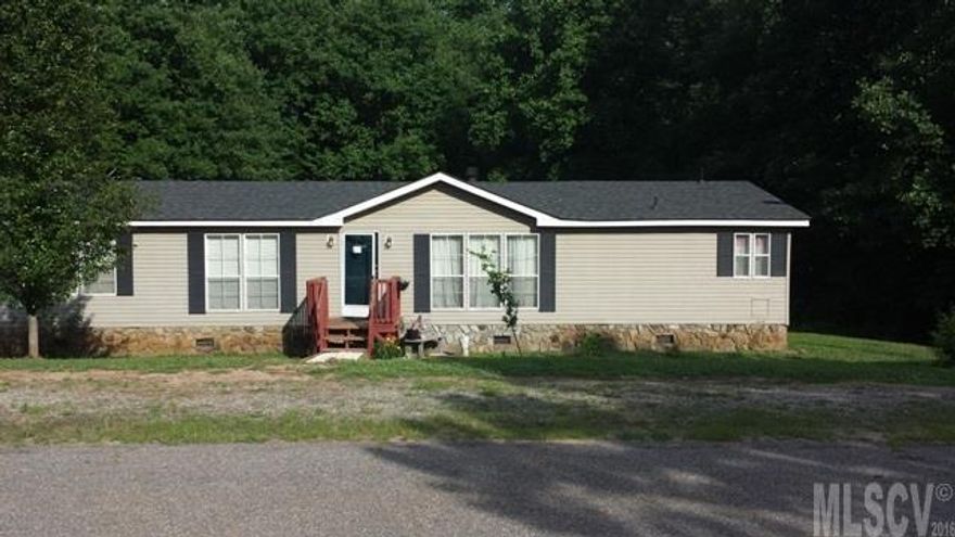 Over 1700 sq.ft. home with 3 bedrooms, 2baths. Heat pump 2013, roof 2012, listed under tax value. Extra lot included. Living room with fireplace, Kitchen w/island, separate dining room, split bedroom plan, master bedroom has huge walk in closet, master bath has garden tub, separate shower. FHA ready. $65,000