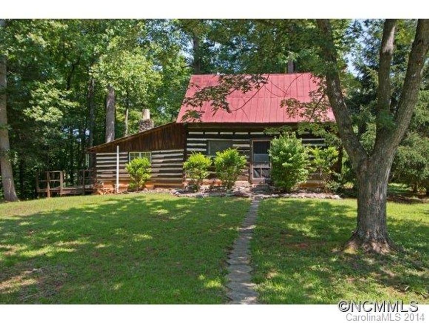 Own a piece of Lake Lure History! Legend has it that this historical home was built in the 1800's as one of the original Stagecoach Relay Stations for the Lincolnton Stage Coach Line. Located in the gated community of Riverbend. As soon as you walk in, you immediately feel a sense of history. Construction is from different types of wood and log, truly unique! Two fireplaces, screened porch, deck, and vintage charm that has to be seen firsthand!