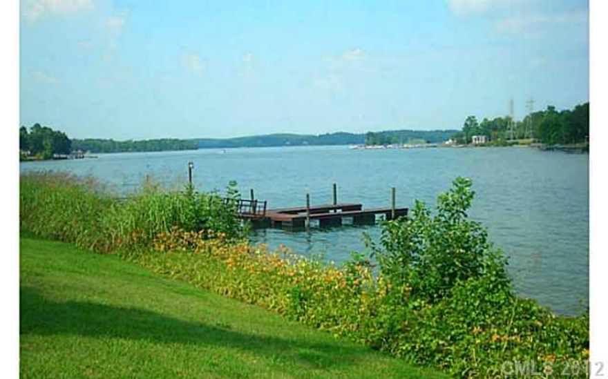 Spectacular waterfront lot with big open view.  Level building site, with lovely views of the Little Allison Creek channel of Lake Wylie.  Great area for fishing, boating and water sports.  Dock in place, plus lakeside gazebo to enjoy while you build.  Seawall for shore stabilization, plus 6" well on property.  Terrific spot for a showplace home on the lake.