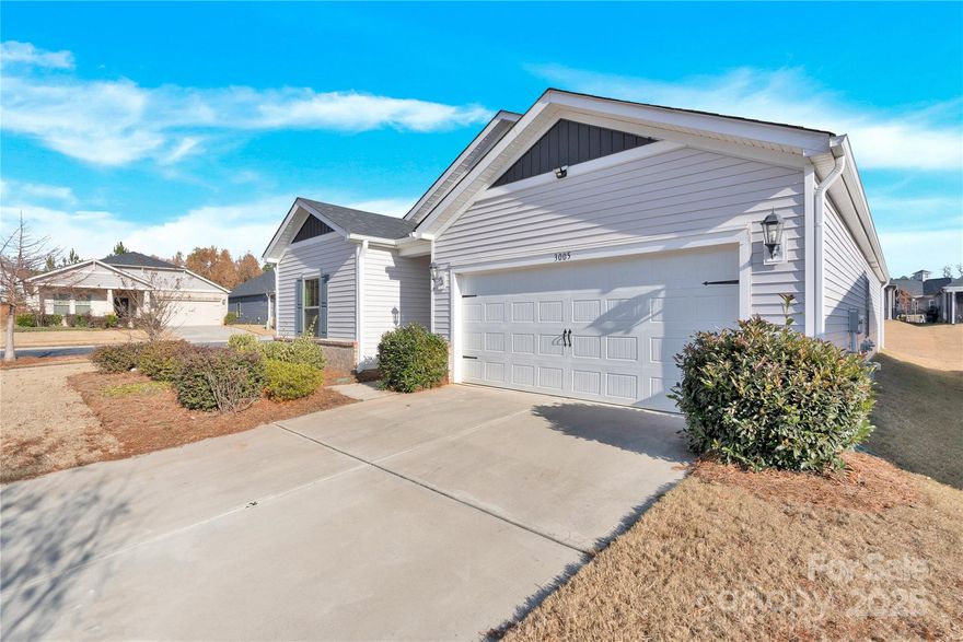 Welcome to this stunning, nearly new one-level ranch home where modern elegance, comfort, and efficiency come together effortlessly. Designed for luxurious yet low-maintenance living, this bright and open floor plan offers a neutral color palette, warm Oyster Oak luxury vinyl plank flooring, and versatile spaces—including a main-level bonus/flex room perfect for an office, playroom, or guest area. A convenient drop zone and inviting gas fireplace add both function and charm. entire house has updated light fixture and fan with remote control.

At the heart of the home is a beautifully appointed gourmet kitchen featuring a spacious island, gas cooktop, stainless steel appliances, Tahoe Harbor painted cabinetry, and striking granite countertops. The open-concept family room flows seamlessly into a fully screened, covered patio—enhanced by a recently added extended concrete pad—creating an ideal space for year-round indoor/outdoor living.

The expansive owner’s suite offers a serene retreat with a generous walk-in closet and spa-like finishes. Outdoors, a premium black aluminum fence frames the backyard, offering both style and privacy while leaving plenty of room to enjoy or further expand your outdoor living space.

Located in a well-situated Charlotte community with easy access to highways, thoroughfares, shopping, and daily amenities. Neighborhood features include a clubhouse, pool, playground, walking areas, and regular social gatherings. HOA dues cover exterior maintenance and lawncare for truly effortless living.